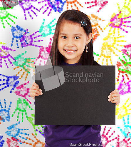Image of Young Cheerful Girl With A Blank Board