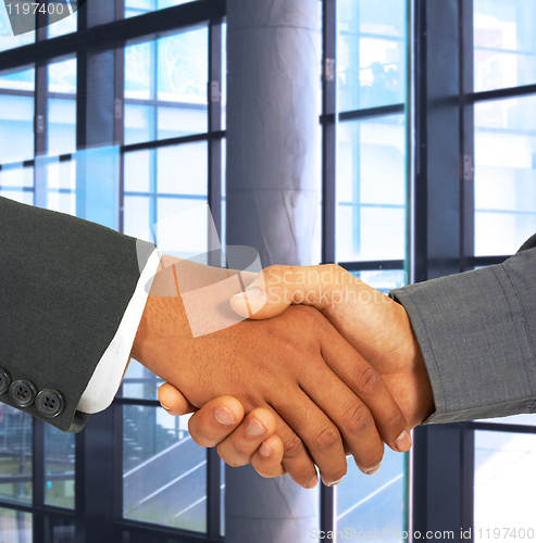 Image of Shaking Hands To Seal An Agreement