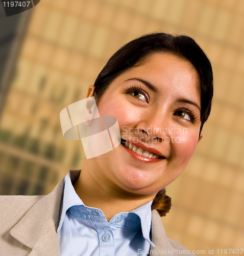 Image of Business Woman Standing Outsite Her Company Headquarters