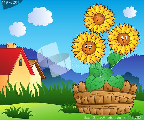 Image of Meadow with three cute sunflowers