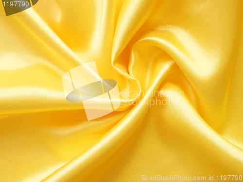 Image of Smooth elegant golden silk as background 