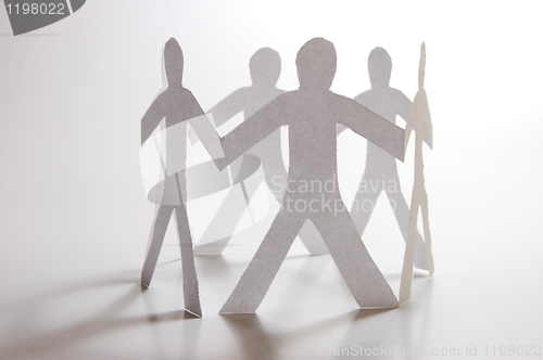 Image of teamwork of paper man