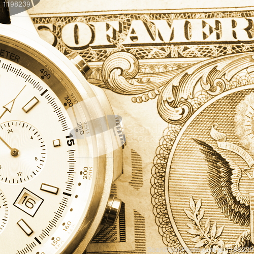 Image of money and watch