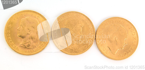 Image of Gold Netherland coins on white background