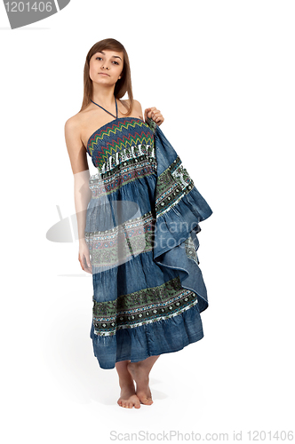 Image of beautiful girl in jeans sarafan