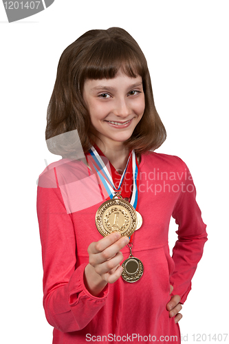 Image of Girl shows gold medal