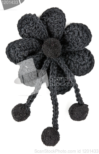 Image of black knitted fabric flower