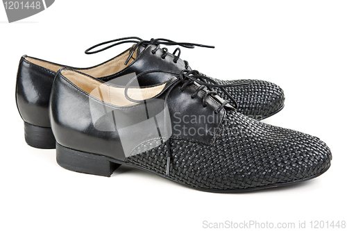 Image of stylish pair of black leather shoes