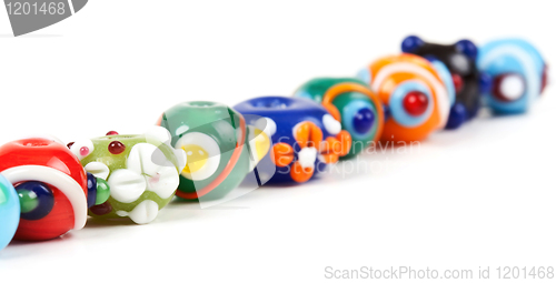 Image of colored glass beads hand