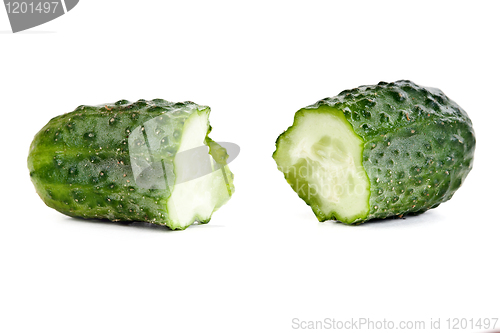 Image of ripe cucumber is broken in half