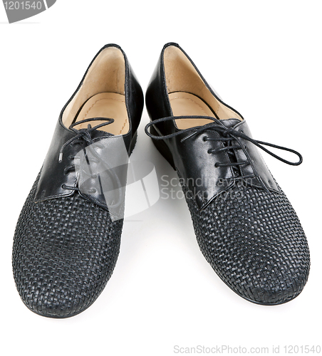 Image of stylish pair of black leather shoes