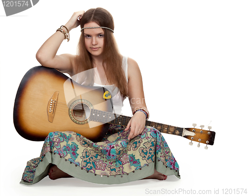 Image of hippie girl with a guitar
