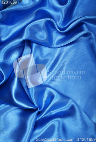 Image of Smooth elegant blue silk can use as background 