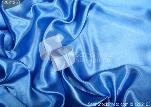 Image of Smooth elegant blue silk can use as background 