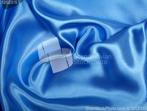 Image of Smooth elegant blue silk can use as background 