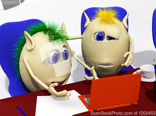 Image of Two puppets looking at laptop with sorrow