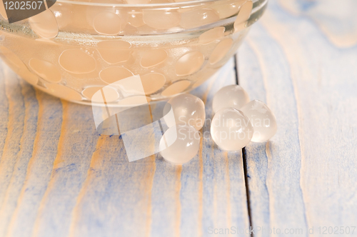 Image of tapioca pearls with lime. white bubble tea ingredients