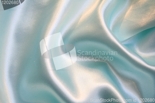 Image of Smooth elegant blue silk as background