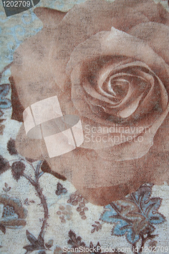 Image of Pattern with rose on a fabric as background