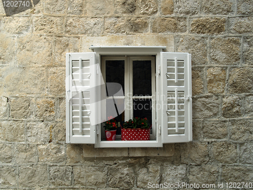 Image of Window on stone wall