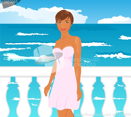 Image of girl on quay at the sea