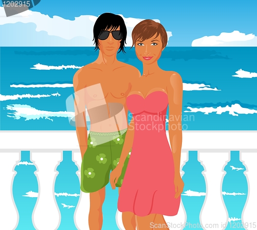 Image of young couple on quay at the sea