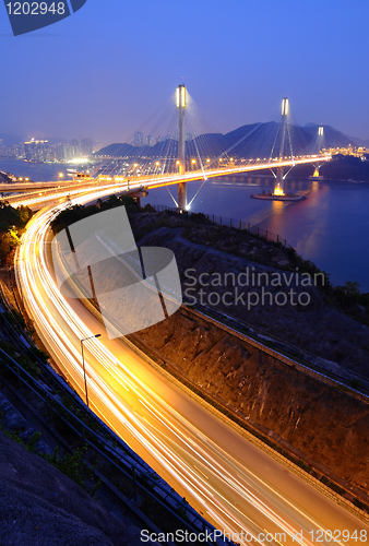 Image of highway and Ting Kau bridge at night