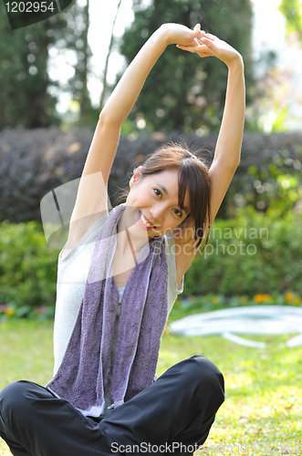 Image of woman doing stretching exercise