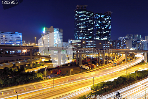 Image of traffic in modern city at night