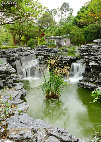 Image of chinese garden with flowing water