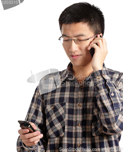 Image of man talking on mobile phone