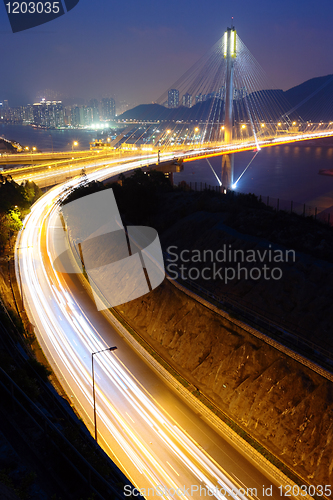 Image of highway and Ting Kau bridge at night