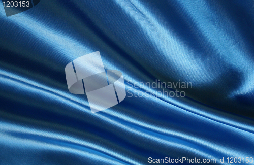 Image of Smooth elegant blue silk as background 