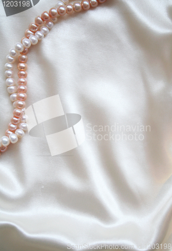 Image of Smooth elegant white silk with pearls as background 