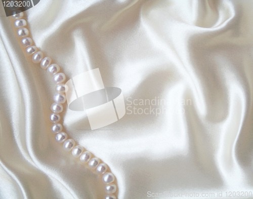 Image of Smooth elegant white silk with pearls as wedding background