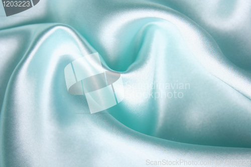 Image of Smooth elegant blue silk as background