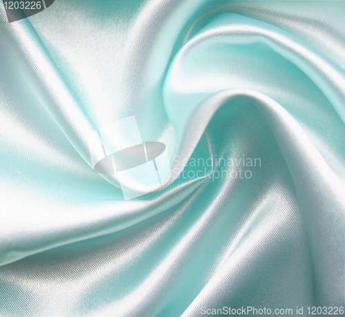 Image of Smooth elegant blue silk as background 