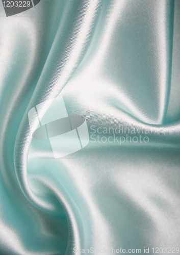 Image of Smooth elegant blue silk as background 