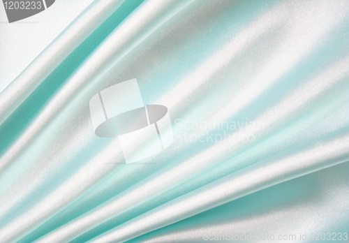 Image of Smooth elegant blue silk as background