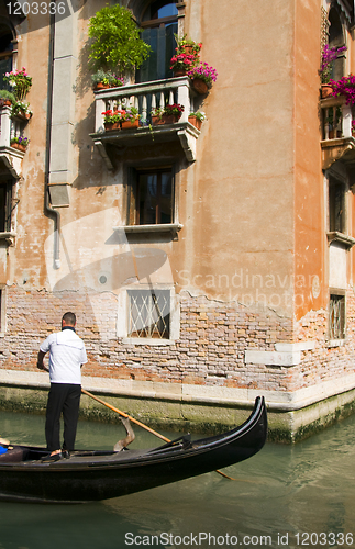 Image of gondolier on canal Venice Italy 