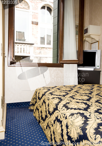 Image of interior single room three star hotel Venice