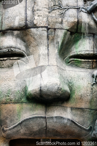 Image of face above an entrance