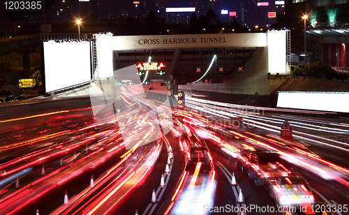 Image of Fast moving cars at night 