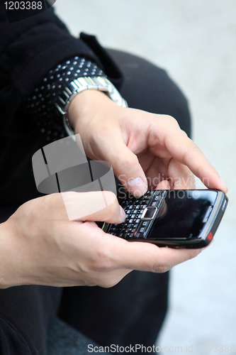 Image of Mobile phone in man hand 