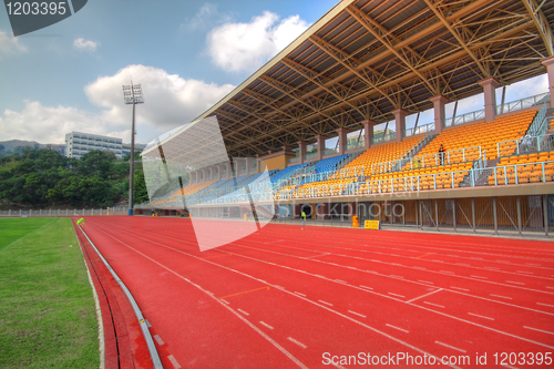 Image of landscape of Coach and reserve benches with seats in football st