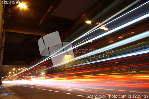 Image of Fast moving cars at night 