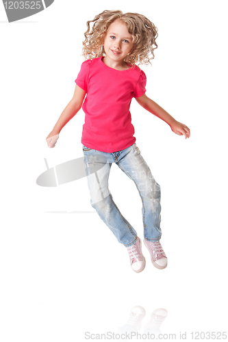 Image of Happy jumping girl with heels together