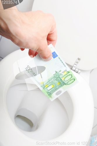 Image of money and toilet