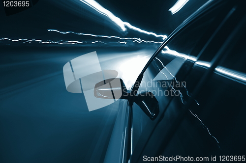 Image of night drive with car in motion 