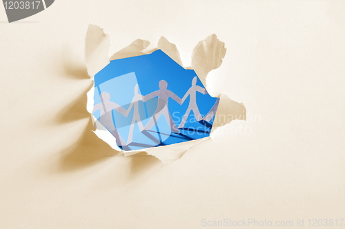 Image of paper man in a hole